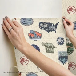 Jurassic World Badges Peel & Stick Wallpaper Beige - RoomMates -Children Products Store GUEST e405b9a5 b58f 40e0 b7d9 727072ebf4cc