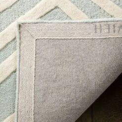 Safavieh Kids SFK910 Hand Tufted Area Rug - Safavieh -Children Products Store GUEST f320feed 6e60 4952 96ce bfe3189f733d